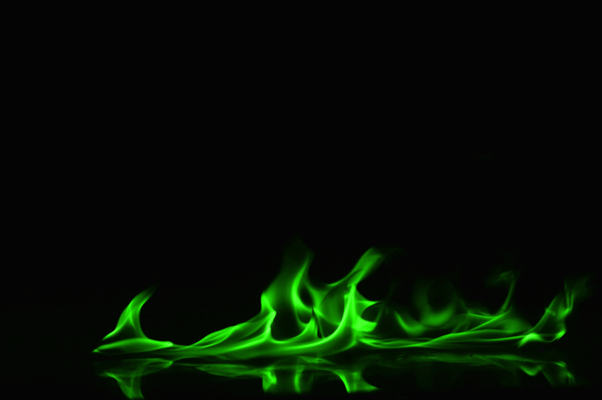 Green Flames on Black Background