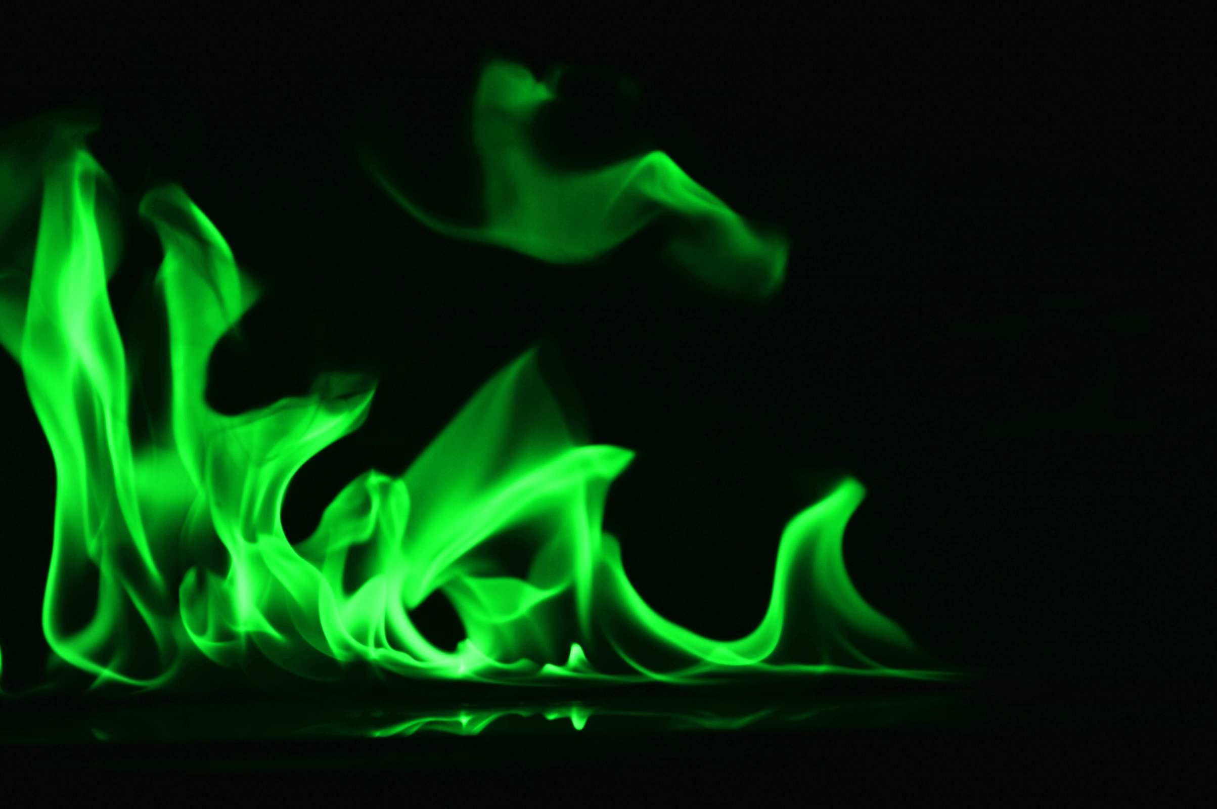 Green Flames on Black Background